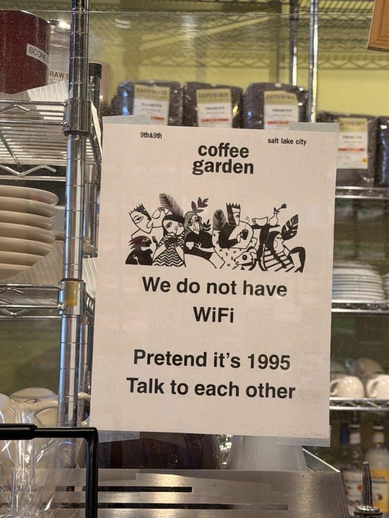 Picture of a Sign that reads "We do no have Wifi. Pretend it's 1995. Talk to each other"